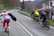 Pro Cyclists Can’t Take off a Rain Jacket on the Move, Either