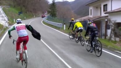 Pro Cyclists Can’t Take off a Rain Jacket on the Move, Either